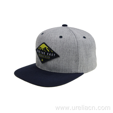 Flat peak cap with woven label patch
